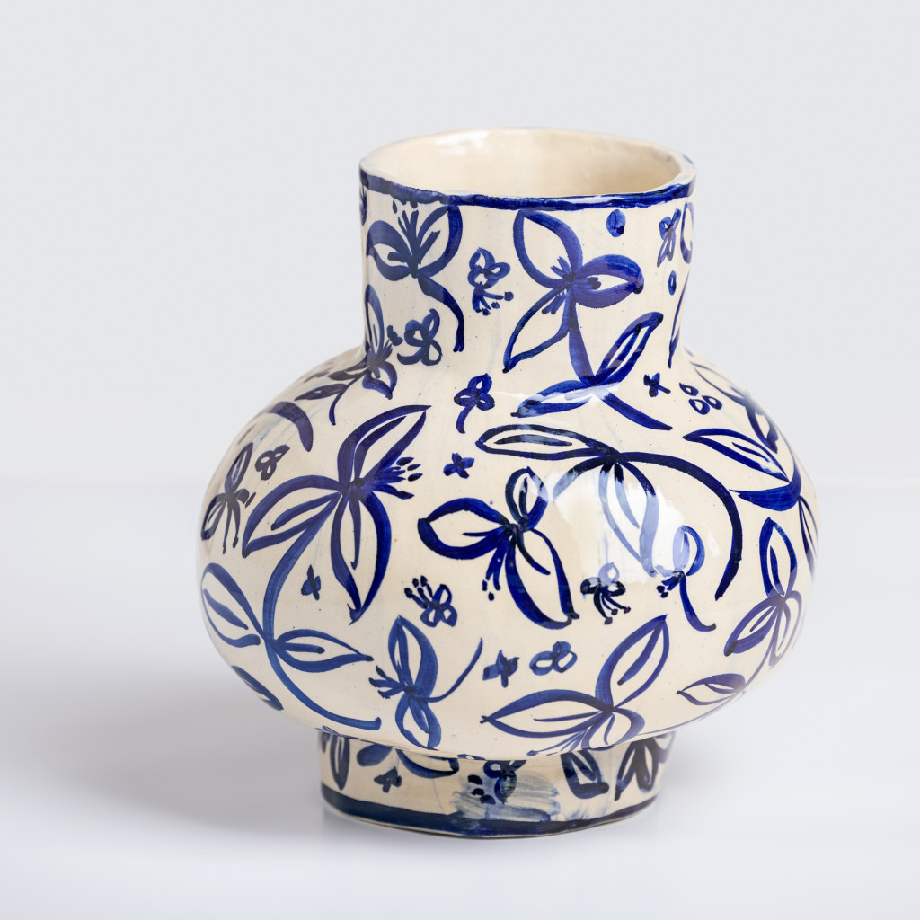 Ceramic large vase with small flowers on white background, handmade and painted in a unique style by Spanish artist Maite Morell.