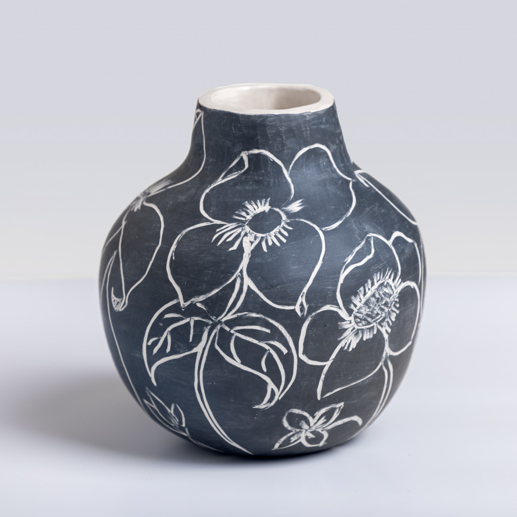 Ceramic vase with exuberant flowers on matte black background, handmade and painted in a unique style by Spanish artist Maite Morell.