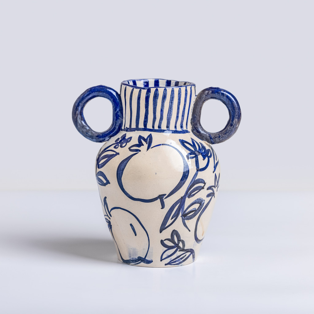 Ceramic vase with blue pomegranates on white background, handmade and painted in a unique style by Spanish artist Maite Morell.