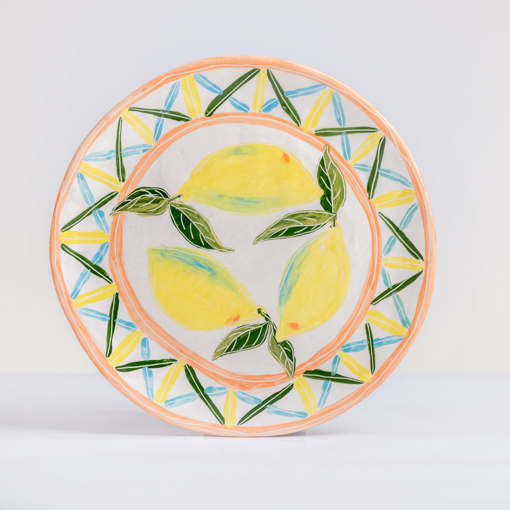 Ceramic decorative plate with lemons with leaves, handmade and painted in a unique & colourful style by Spanish artist Maite Morell.