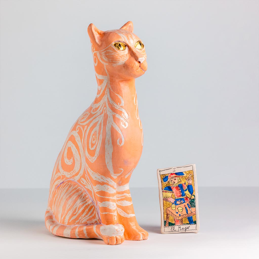 Ceramic sculpture of a cat, handmade and painted in a unique style by Spanish artist Maite Morell.