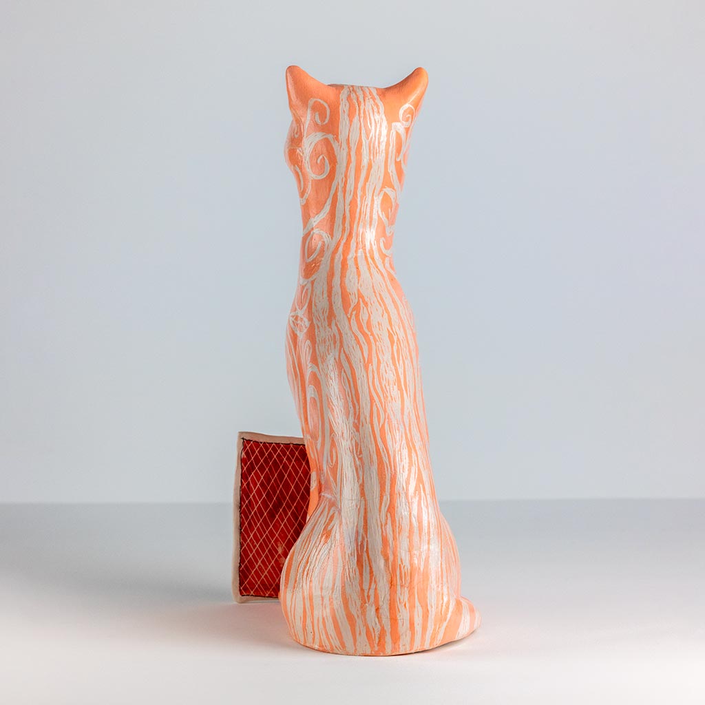 Ceramic sculpture of a cat, handmade and painted in a unique style by Spanish artist Maite Morell.