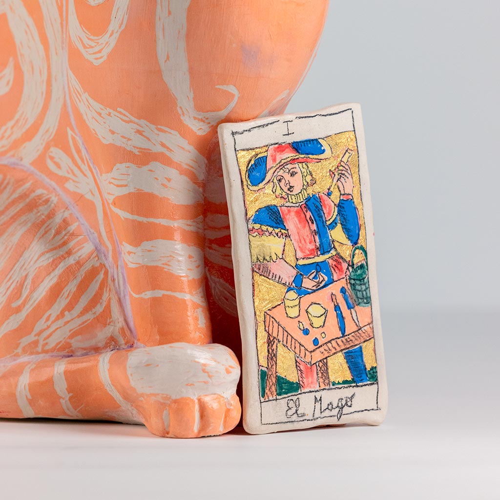 Ceramic sculpture of a cat, handmade and painted in a unique style by Spanish artist Maite Morell.