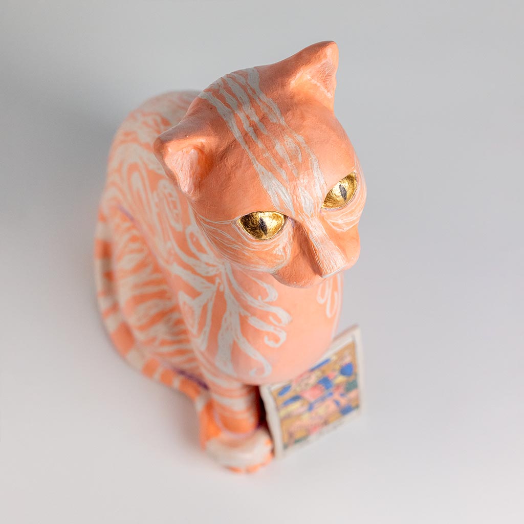 Ceramic sculpture of a cat, handmade and painted in a unique style by Spanish artist Maite Morell.