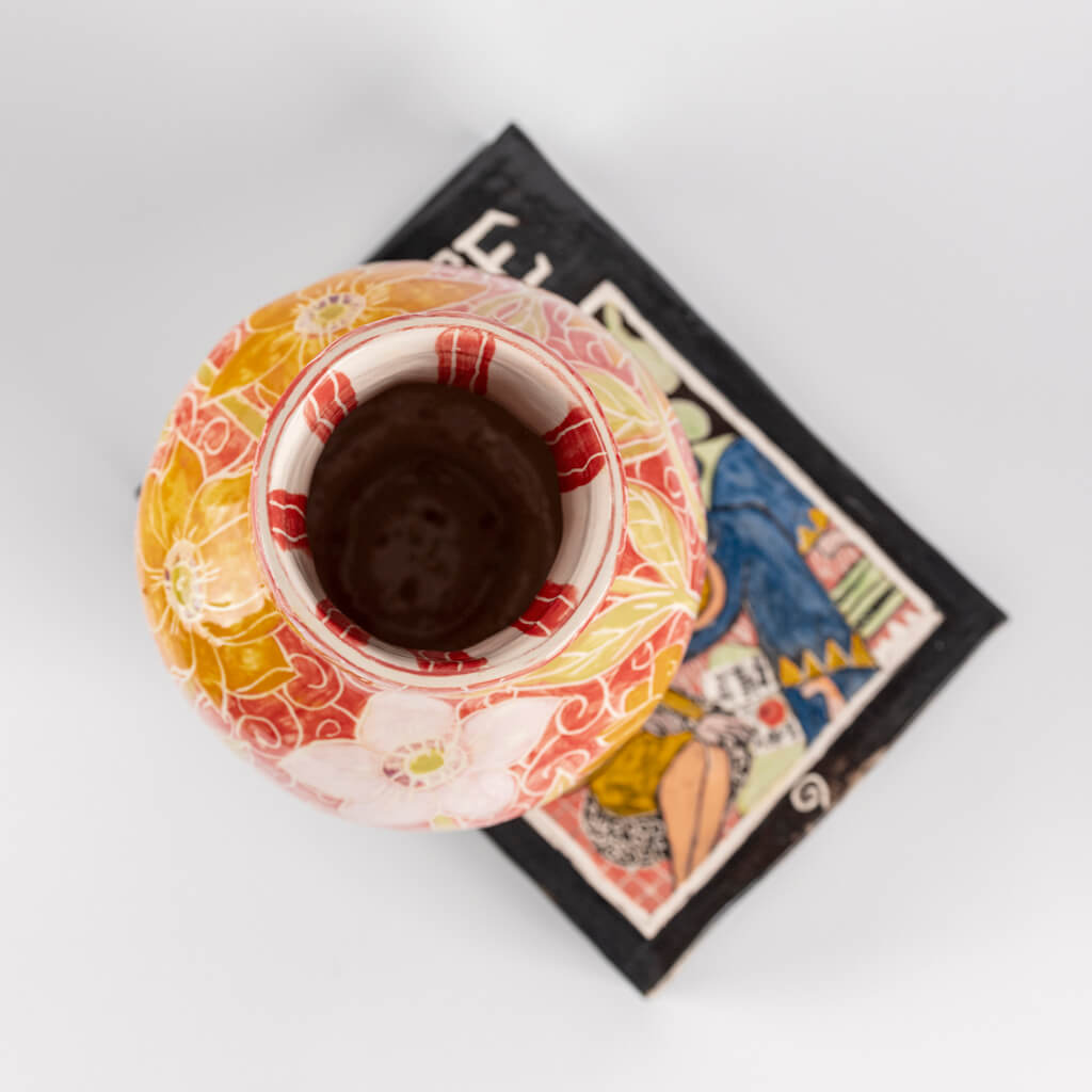 Ceramic still life of a book of Matisse with red vase, handmade and painted in a unique & colourful style by Spanish artist Maite Morell.