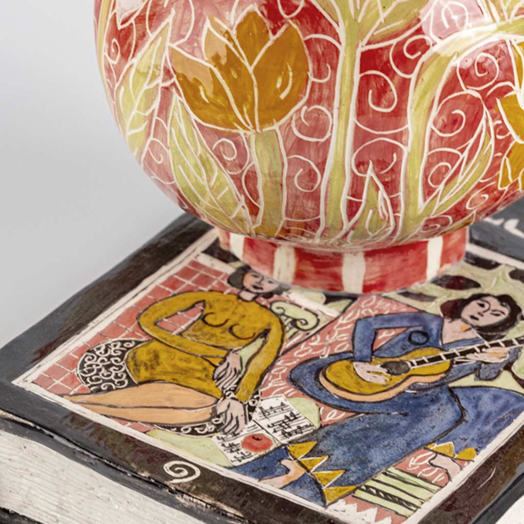 Ceramic still life of a book of Matisse with red vase, handmade and painted in a unique & colourful style by Spanish artist Maite Morell.