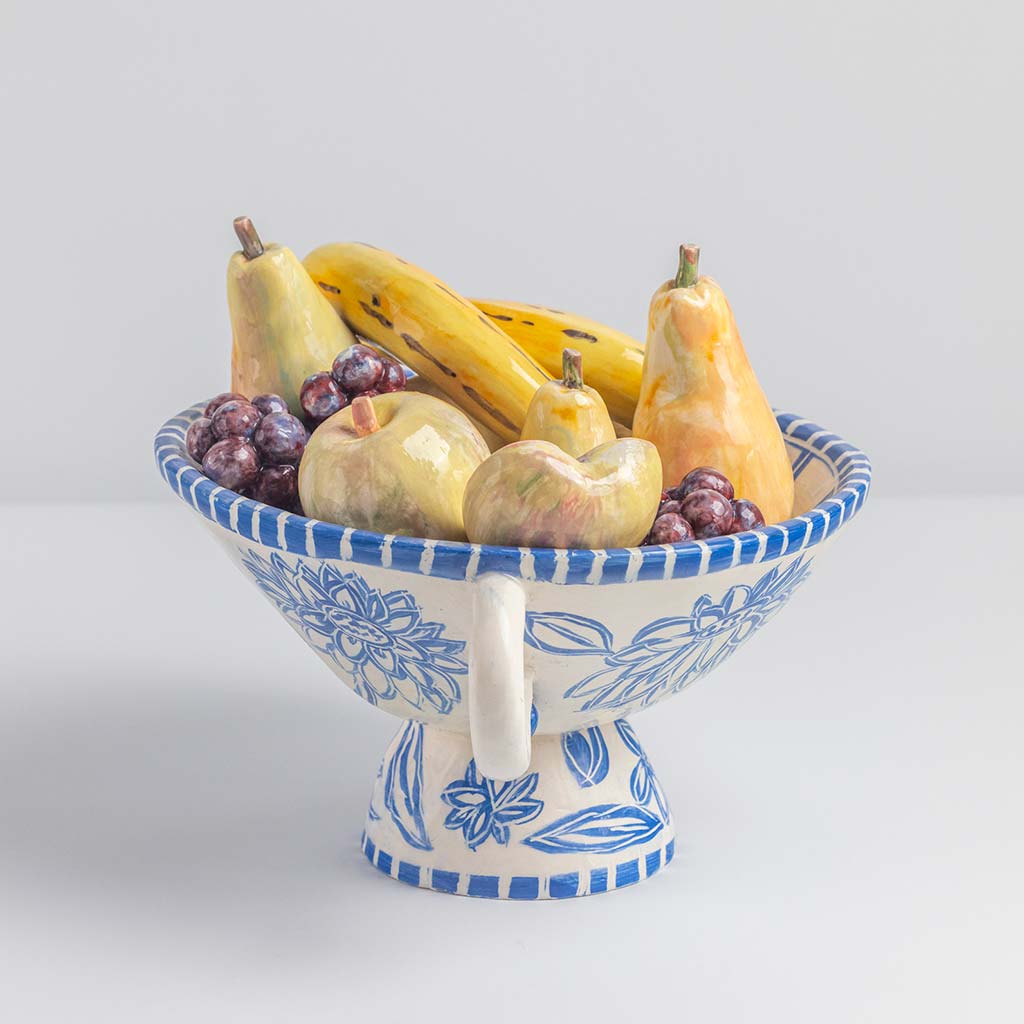 Ceramic still life of a fruit bowl with bananas, handmade and painted in a unique & colourful style by Spanish artist Maite Morell.