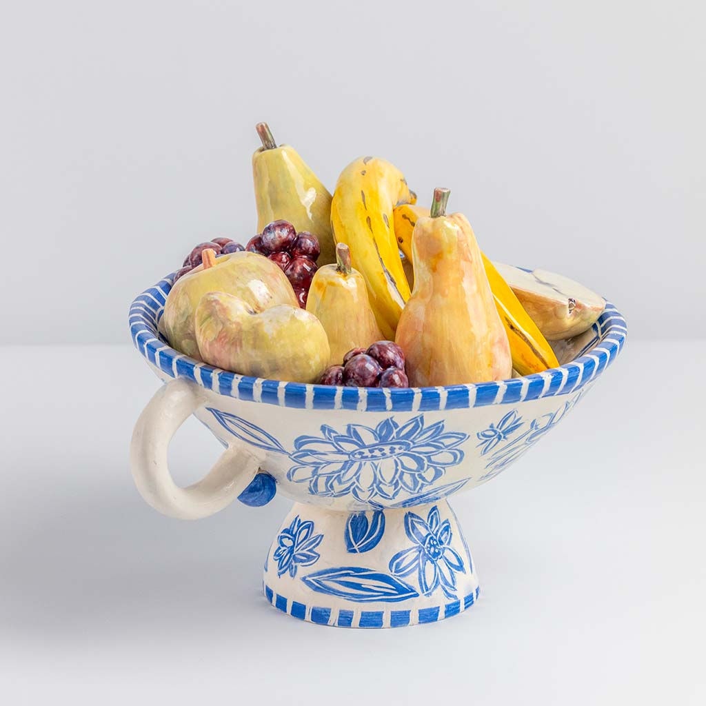 Ceramic still life of a fruit bowl with bananas, handmade and painted in a unique & colourful style by Spanish artist Maite Morell.
