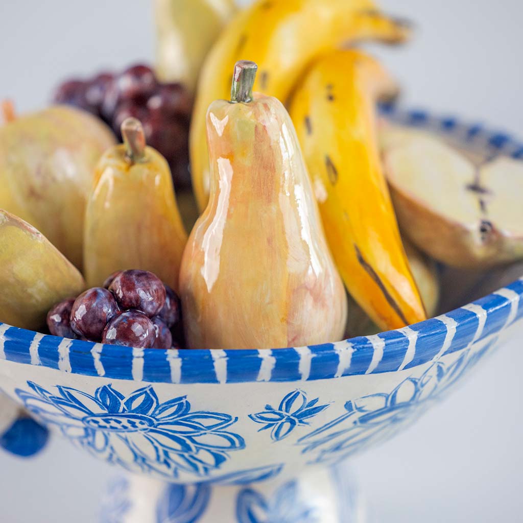 Ceramic still life of a fruit bowl with bananas, handmade and painted in a unique & colourful style by Spanish artist Maite Morell.