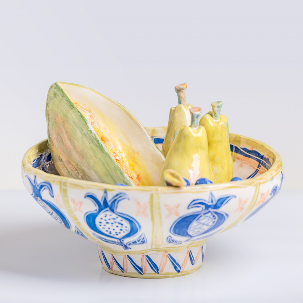 Ceramic still life with cut melon, pears and blue grapes - handmade and painted in a unique & colourful style by Spanish artist Maite Morell.