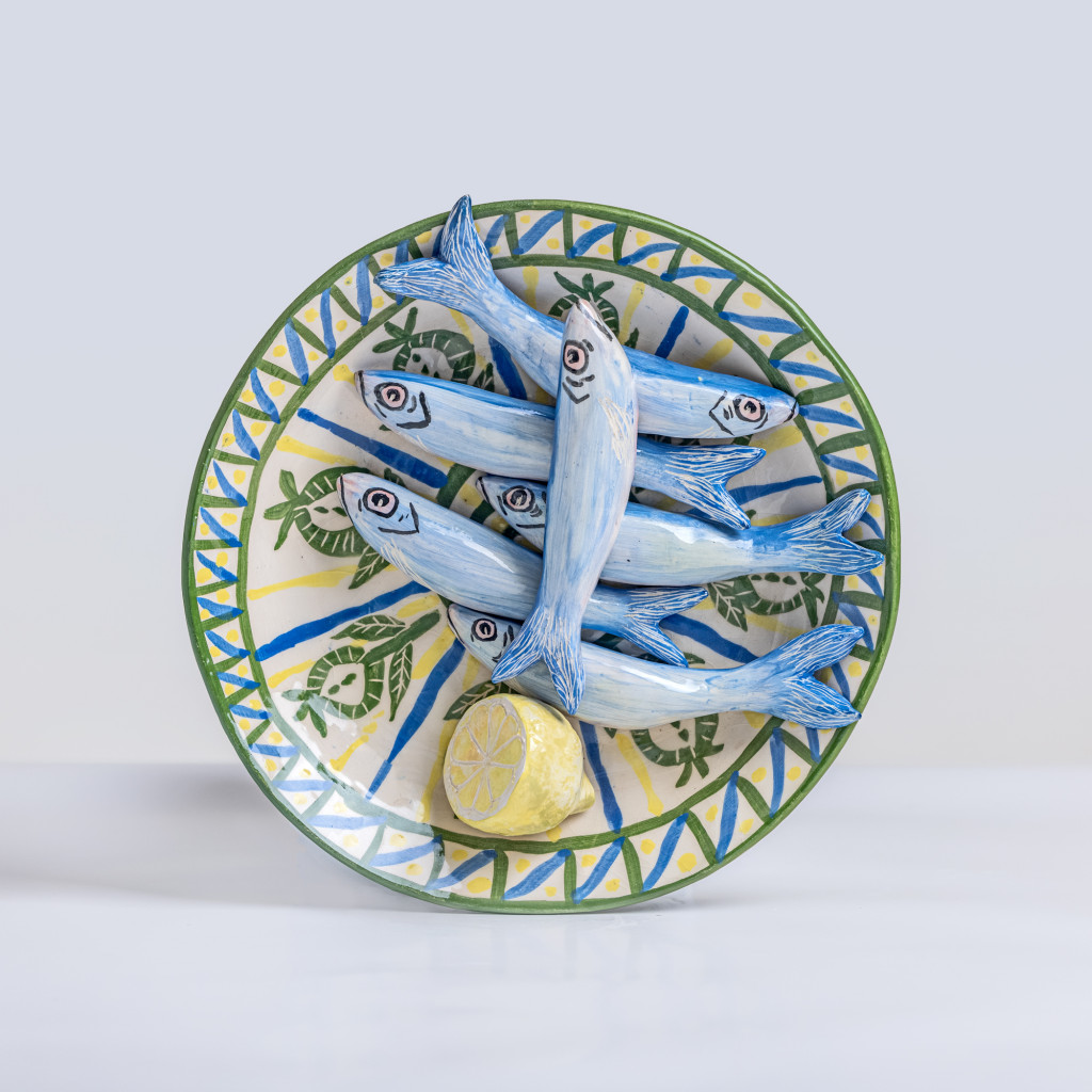 Ceramic still life with sardines and half a lemon, handmade and painted in a unique & colourful style by Spanish artist Maite Morell.