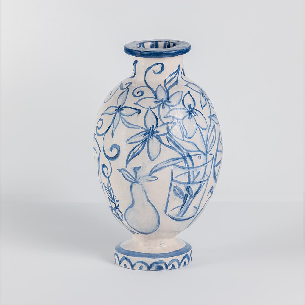 Ceramic vase with blue pears and flowers on white background, handmade and painted in a unique style by Spanish artist Maite Morell.