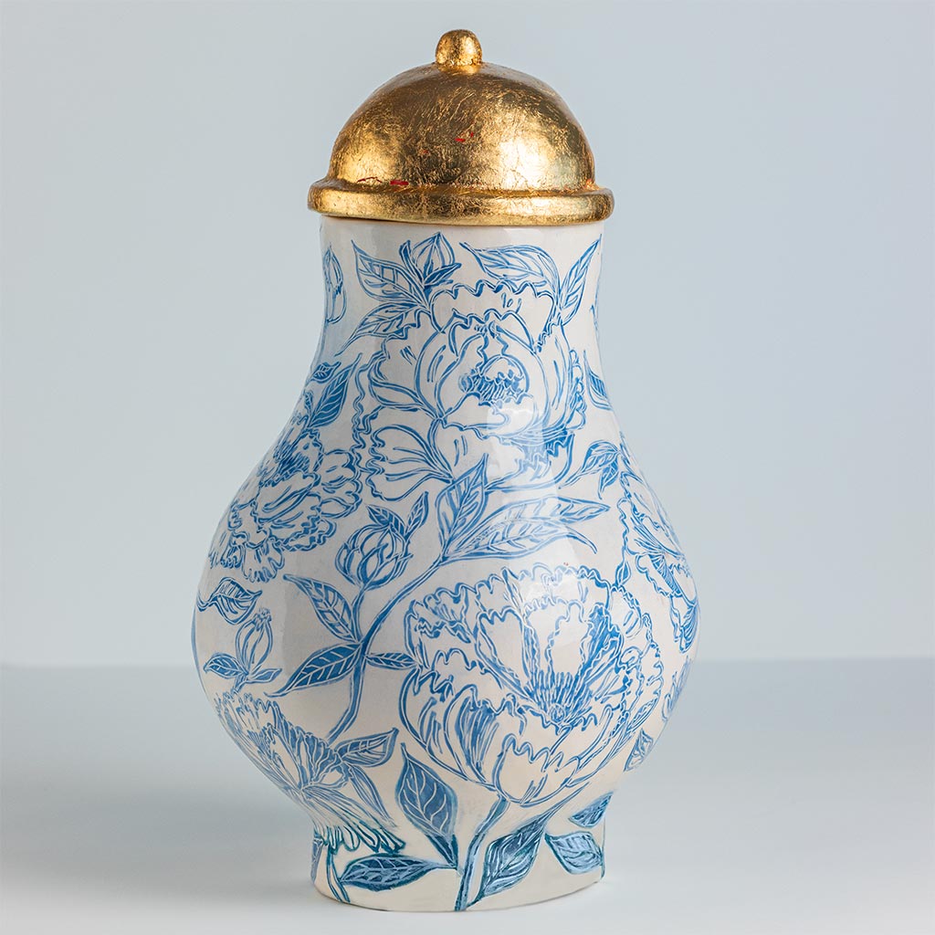 Ceramic large vase with blue gardenias on white background and gold lid, handmade and painted in a unique style by Spanish artist Maite Morell.