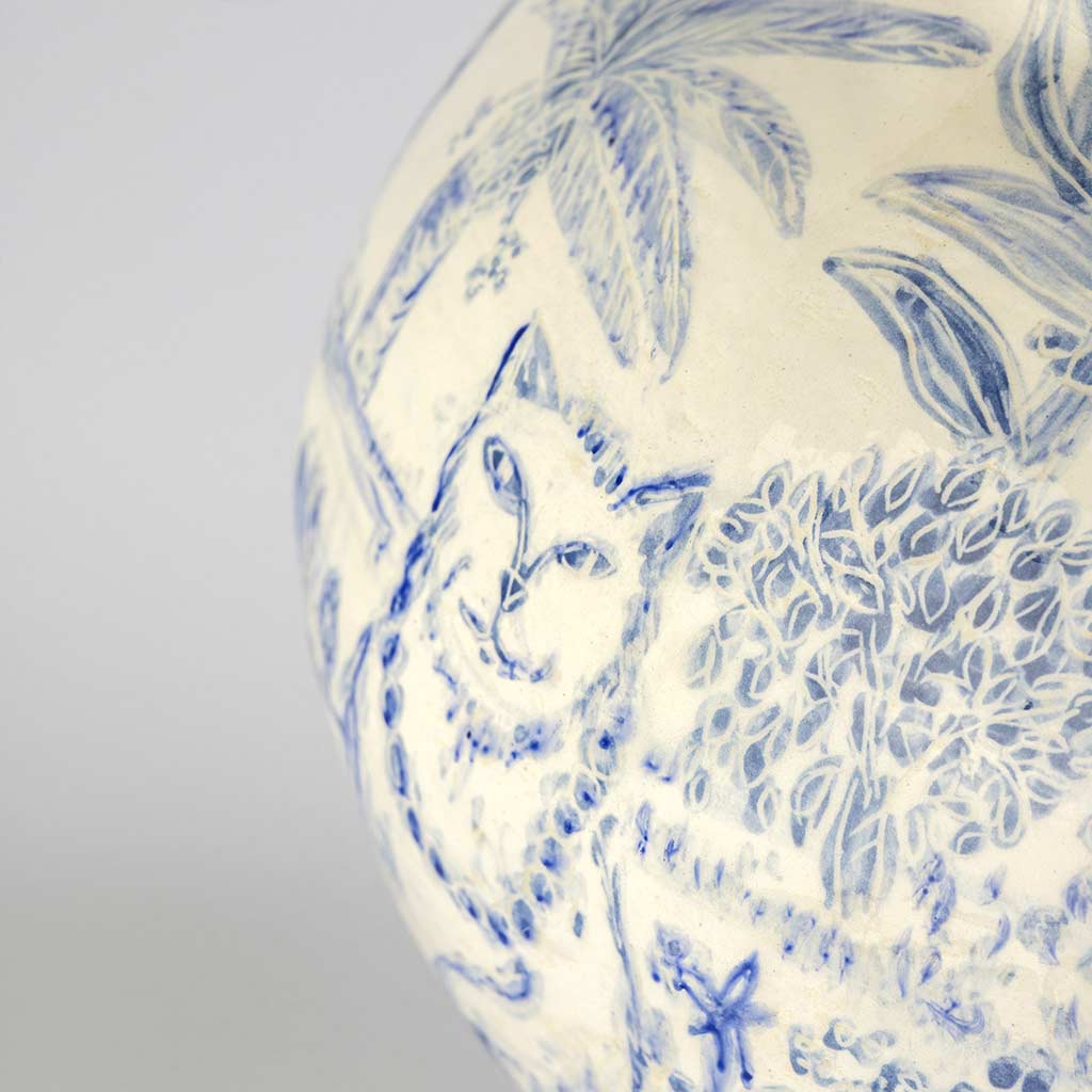 Ceramic large vase with self-portrait and black cat whiskers on white background and gold lid, handmade and painted in a unique style by Spanish artist Maite Morell.
