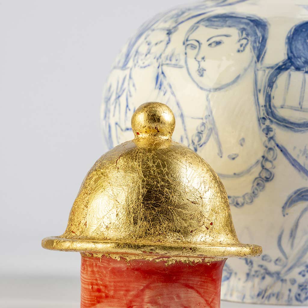 Ceramic large vase with self-portrait and black cat whiskers on white background and gold lid, handmade and painted in a unique style by Spanish artist Maite Morell.