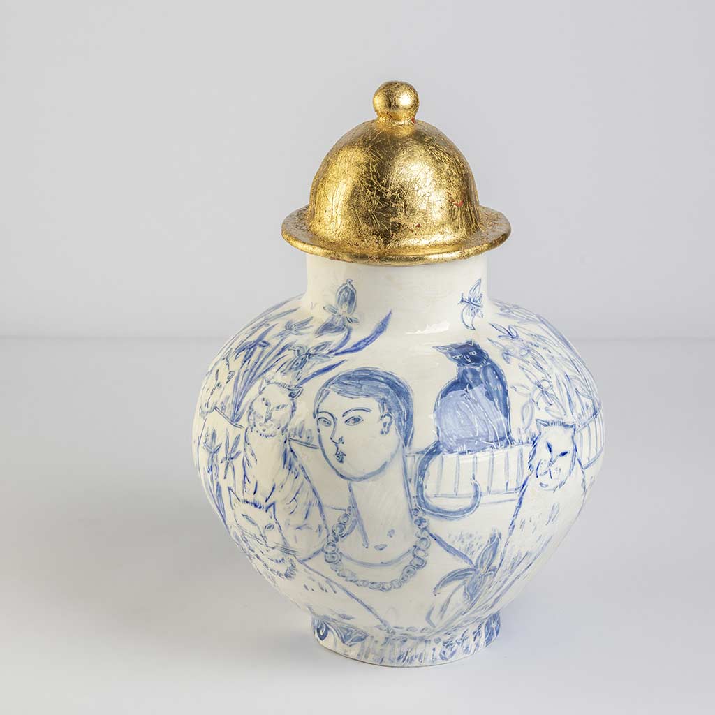 Ceramic large vase with self-portrait and black cat whiskers on white background and gold lid, handmade and painted in a unique style by Spanish artist Maite Morell.