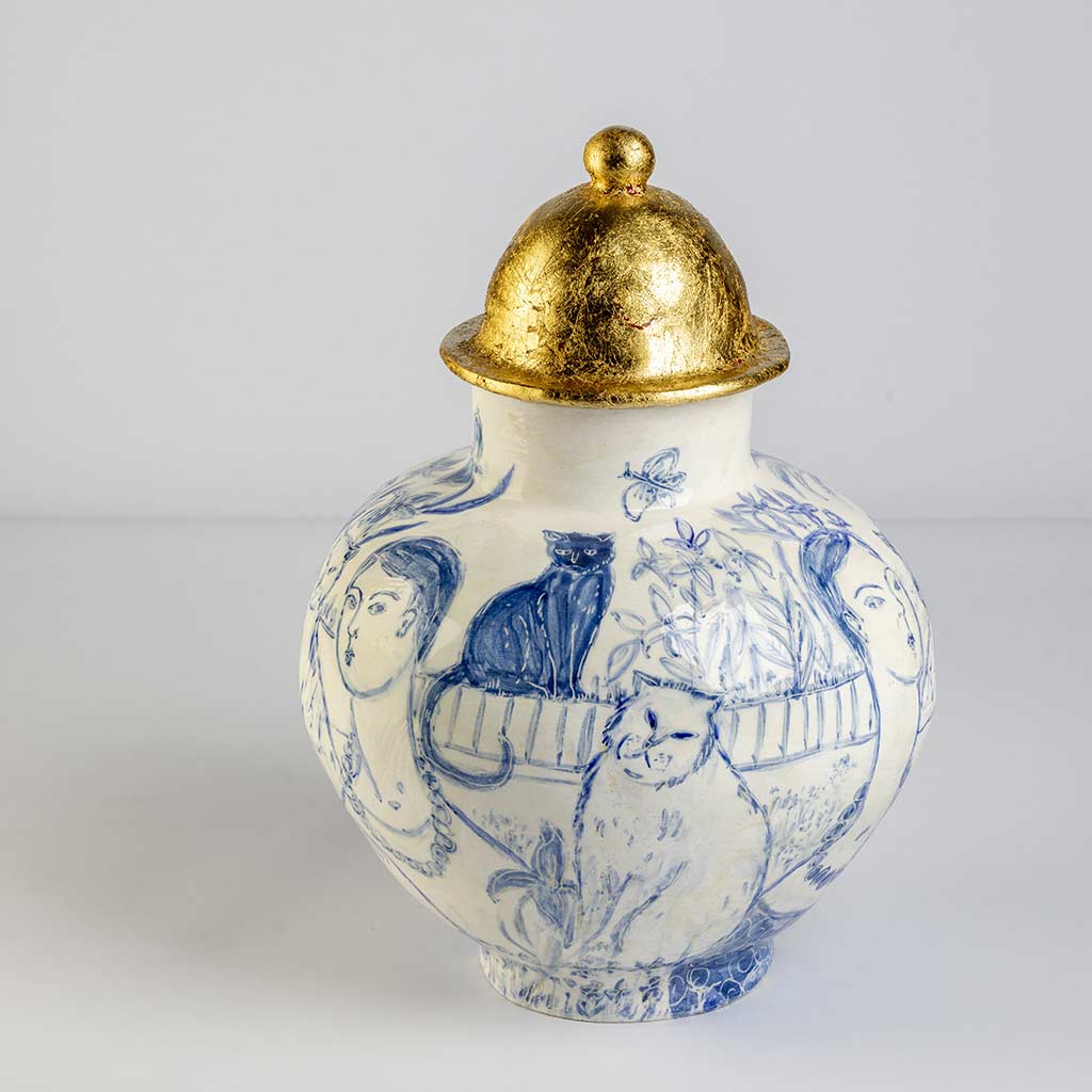 Ceramic large vase with self-portrait and black cat whiskers on white background and gold lid, handmade and painted in a unique style by Spanish artist Maite Morell.