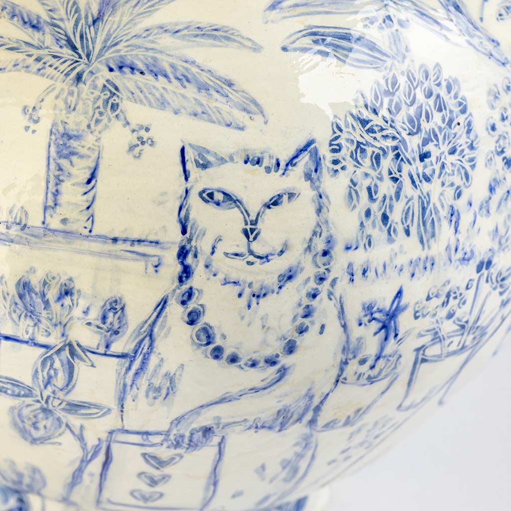 Ceramic large vase with self-portrait and black cat whiskers on white background and gold lid, handmade and painted in a unique style by Spanish artist Maite Morell.