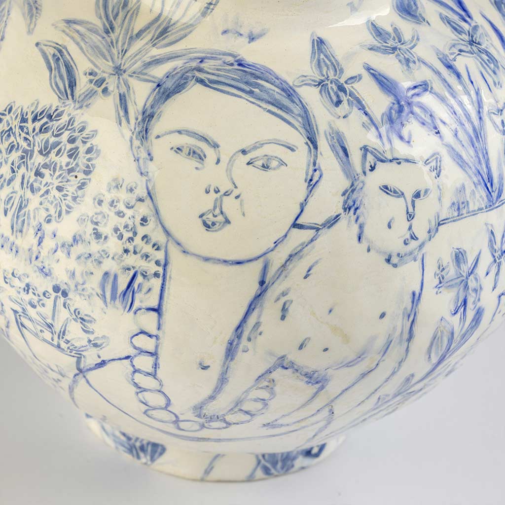 Ceramic large vase with self-portrait and black cat whiskers on white background and gold lid, handmade and painted in a unique style by Spanish artist Maite Morell.