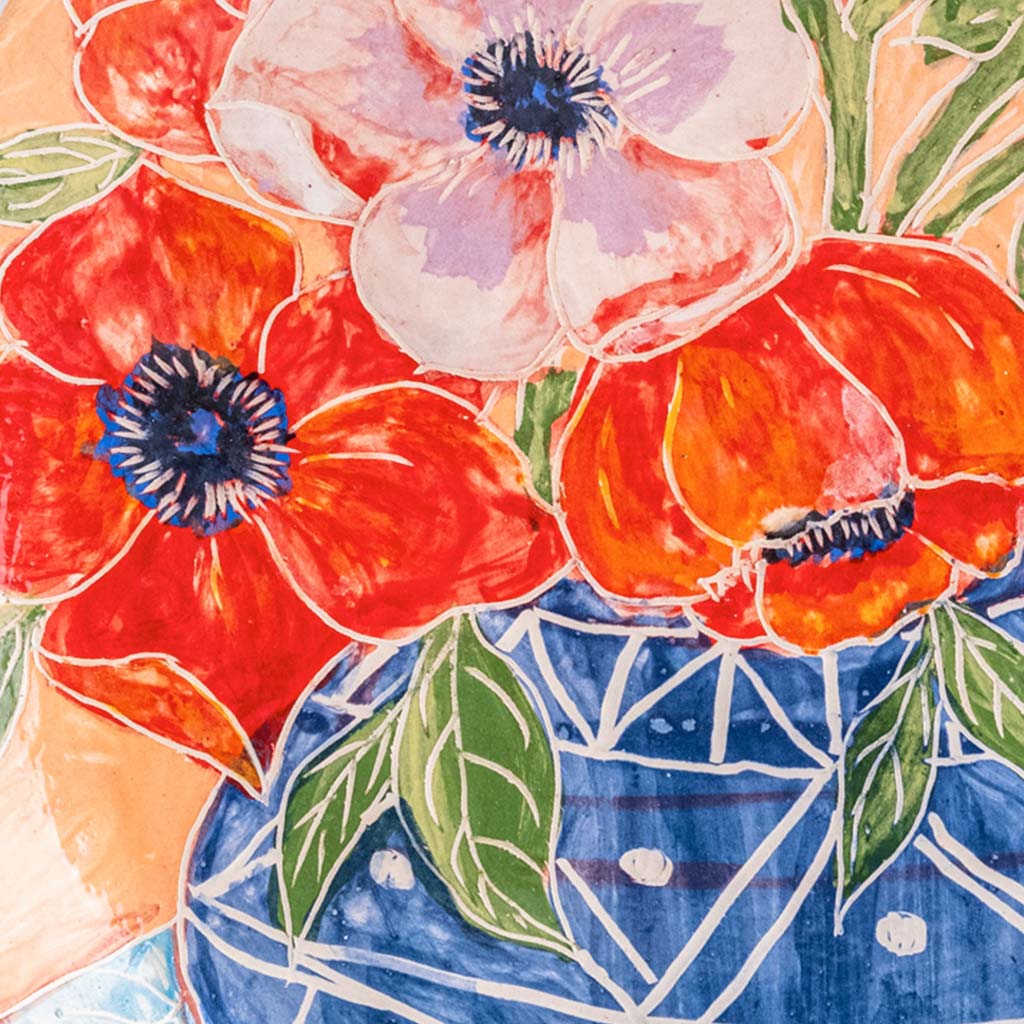 Ceramic decorative plate with anemones in blue vase, handmade and painted in a unique & colourful style by Spanish artist Maite Morell.