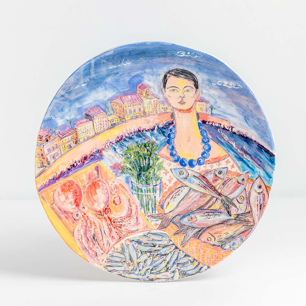 Ceramic plate with self portrait and fish with parsley in Ortigia, handmade and painted in a unique & colourful style by Spanish artist Maite Morell.