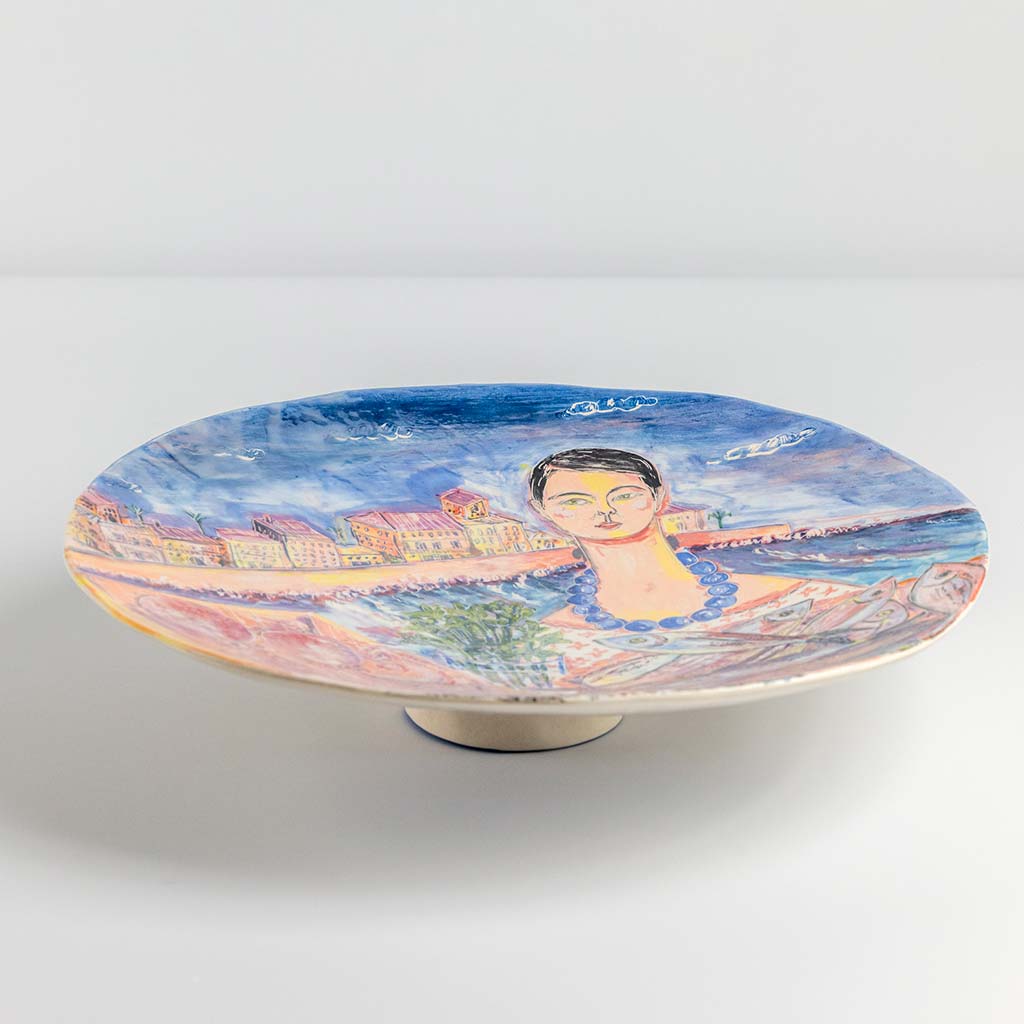 Ceramic plate with self portrait and fish with parsley in Ortigia, handmade and painted in a unique & colourful style by Spanish artist Maite Morell.
