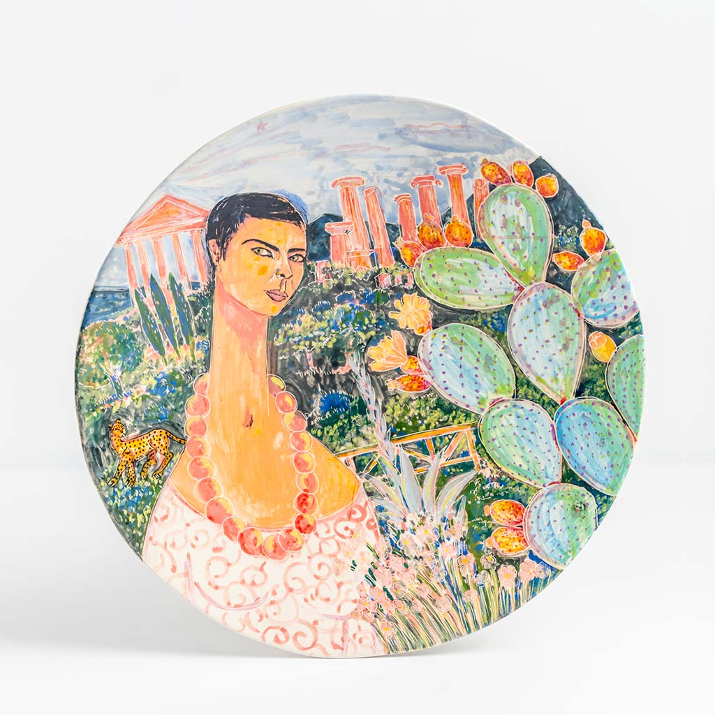 Ceramic plate with self portrait in the valley of the temples in Agrigento, handmade and painted in a unique & colourful style by Spanish artist Maite Morell.
