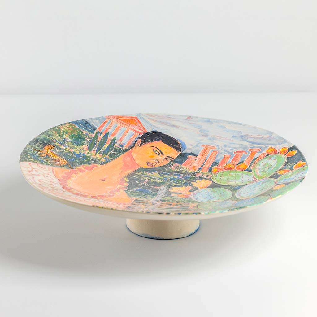 Ceramic plate with self portrait in the valley of the temples in Agrigento, handmade and painted in a unique & colourful style by Spanish artist Maite Morell.